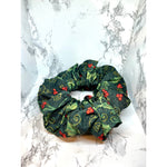 Load image into Gallery viewer, Glitter Holly Christmas Scrunchie
