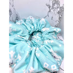 Load image into Gallery viewer, Light Blue Snowflake Winter Scrunchie
